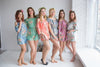 Dusty Toned Mistmatched Bridesmaids Rompers in Dreamy Angel Song Pattern