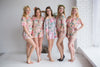 Off the shoulder Mismatched Bridesmaids Rompers in Blush Whimsical Giggles Pattern