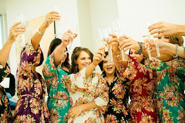 Give each of your bridesmaids a different color robe to get ready in