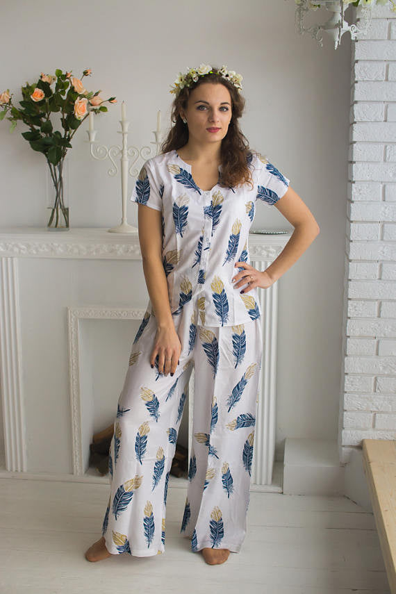 U-shaped neckline Pj Sets in a White Navy feather rhyme Pattern 