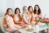 Blush Watercolor Floral Mismatched Styles in Her Petal Garden Bridesmaids Rompers