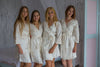 White gold bridesmaids wedding robes in floral sketch pattern