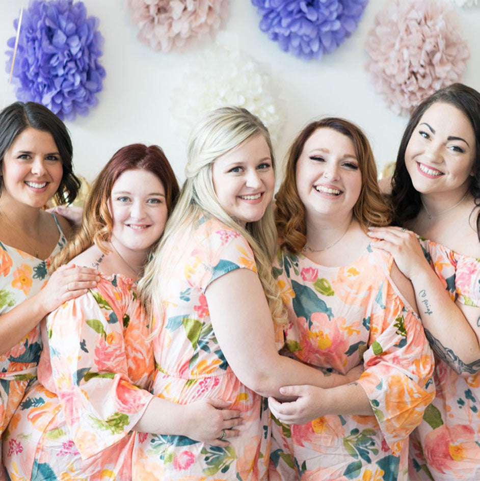 Blush Watercolor Floral Mismatched Styles in Her Petal Garden Bridesmaids Rompers